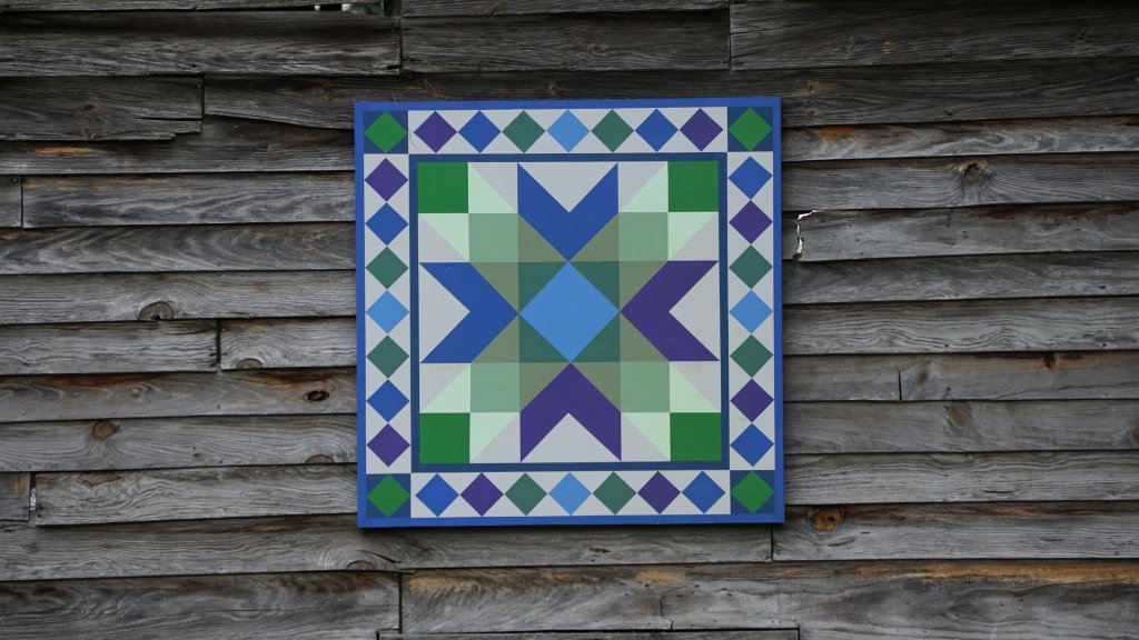 blue and green acm barn quilt