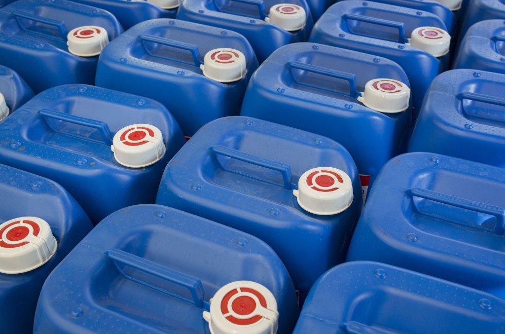 blue plastic chemical containers