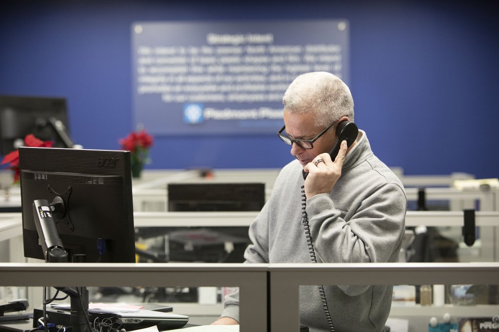 charlotte branch employee on phone