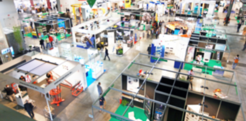 blurred tradeshow crowd  piedmont plastics